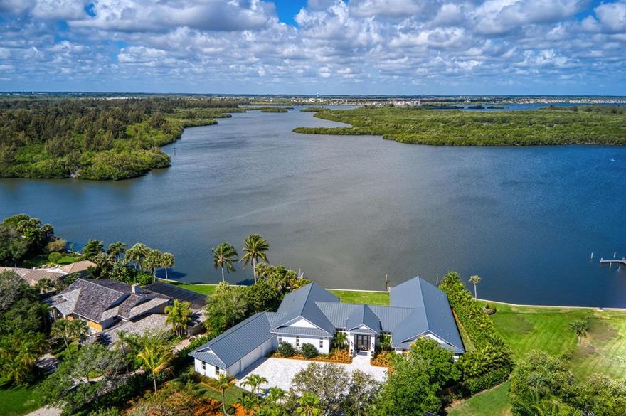 Luxurious NEW Construction, Captivating Riverfront (Intracoastal Waterway) with Dock, 4 Bd, 4.5 Bth, Den, Exercise Rm, Open Flr Plan, Soaring 12'-20' Ceilings, Impact Glass, Walls of 10' High Sliding Glass Doors,  Custom Gourmet Kitchen w/walk-in pantry , 48'' Dual Fuel Range, 48'' Ref/Fr.,2 Dishwashers, Custom 10' Mahogany Entry Doors, Wet Bar, Gas Fireplace, Built-In BBQ. Spectacular Infinity  Edge Pool, 3 Car Gar, Best Sunsets in Vero Beach, Deeded Beach Access. sizes approx & subject to error