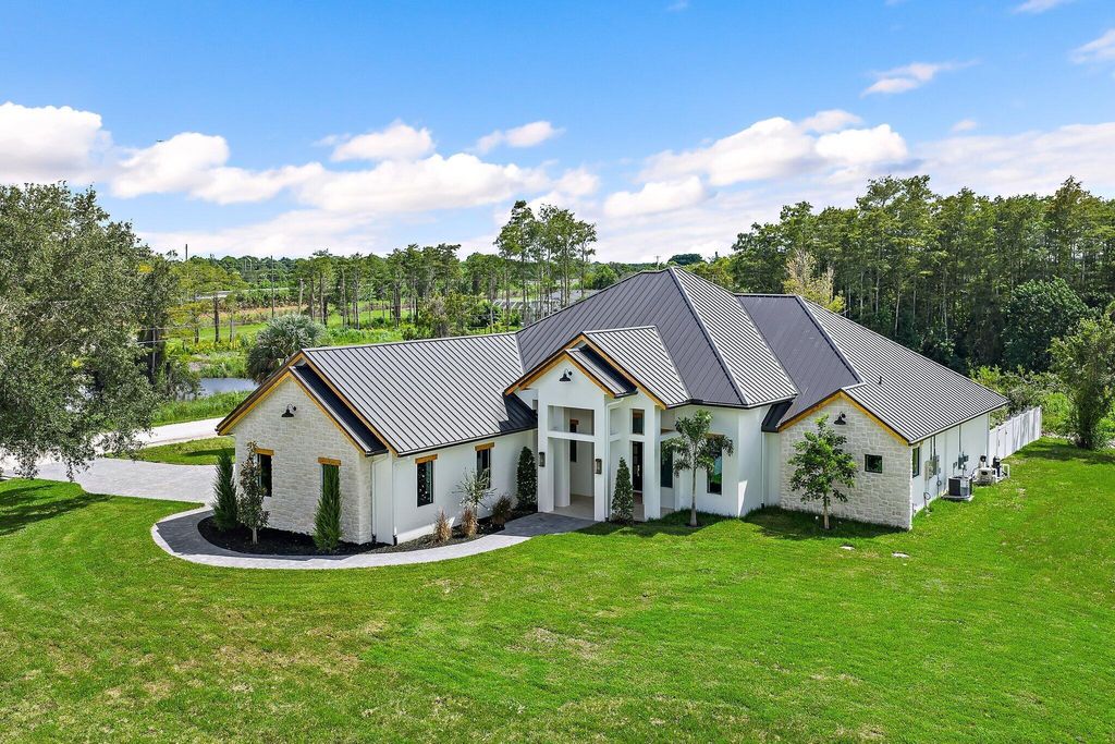 Photo of 7528 169th Place N, Palm Beach Gardens, FL 33418 (MLS # R11129152)