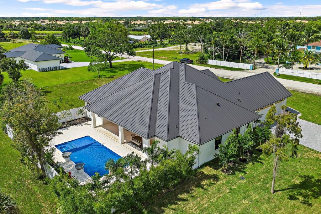 Photo of 7528 169th Place N, Palm Beach Gardens, FL 33418 (MLS # R11129152)