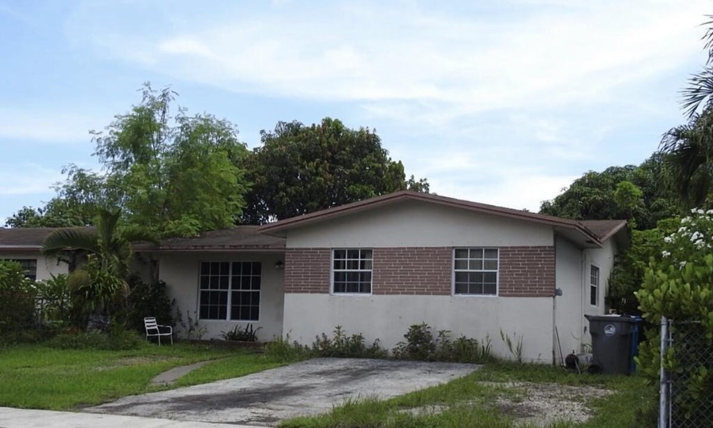 Photo of 5620 SW 37TH Street, West Park, FL 33023 (MLS # B26068938)