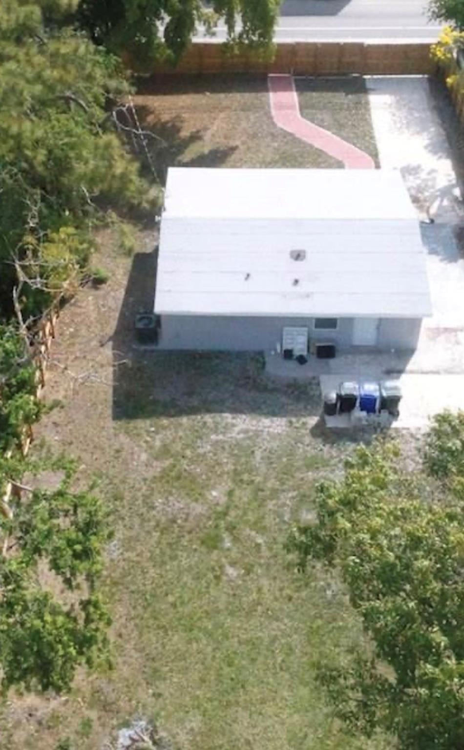 COMPLETELY REMODELED 2 BED / 1 BATH HOME ON 9000 SQUARE FOOT PROPERTY WITH PRIVACY FENCE SURROUNDING WHOLE PROPERTY! IMPACT WINDOWS, CENTRAL A/C, ETC. CLOSE TO DOWNTOWN, SCHOOLS, I-95 AND THE BEACH. PROPERTY IS ZONED COMMERCIAL SO IT IS PERFECT TO PARK COMMERCIAL VEHICLES.