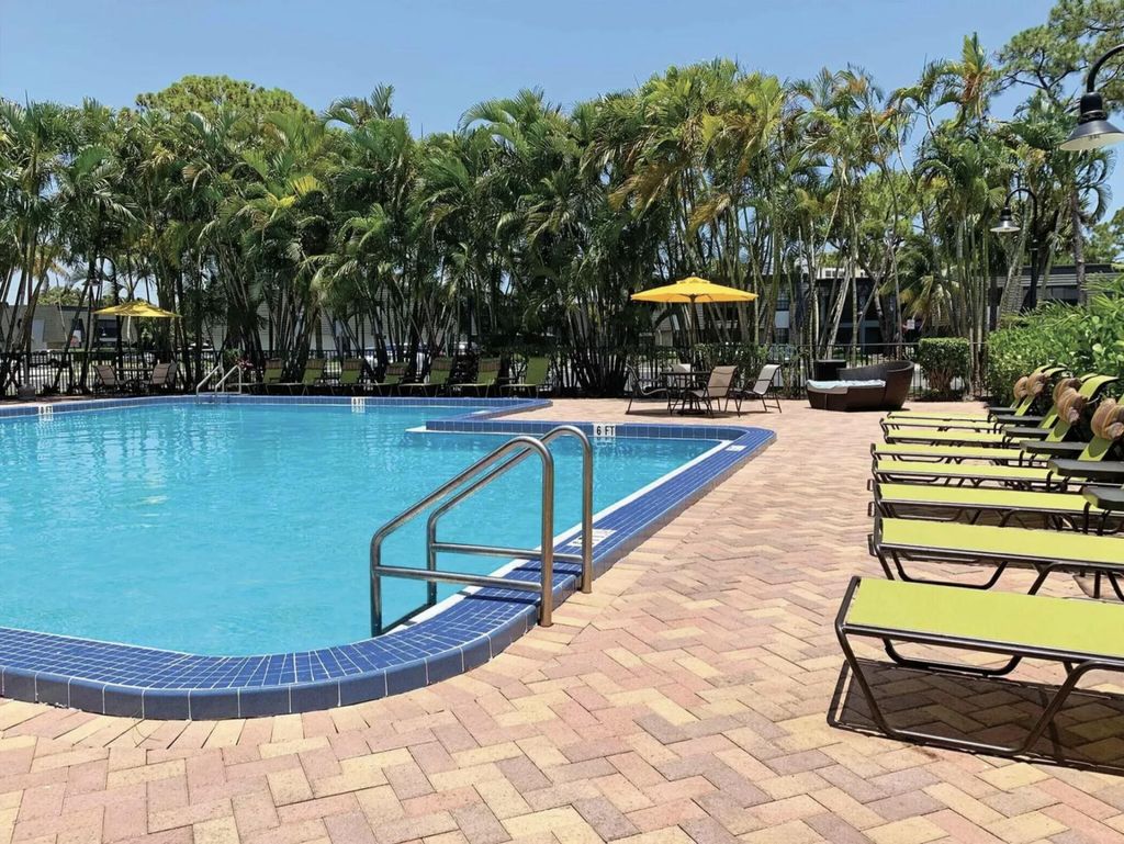 Photo of 4120 Union Square Boulevard #B2, Palm Beach Gardens, FL 33410 (MLS # B26029454)