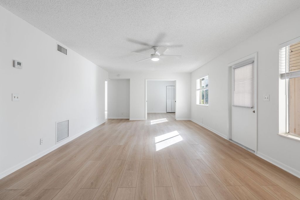 Photo of 3561 Tall Pine Way #D-2, Greenacres, FL 33463 (MLS # B26044159)
