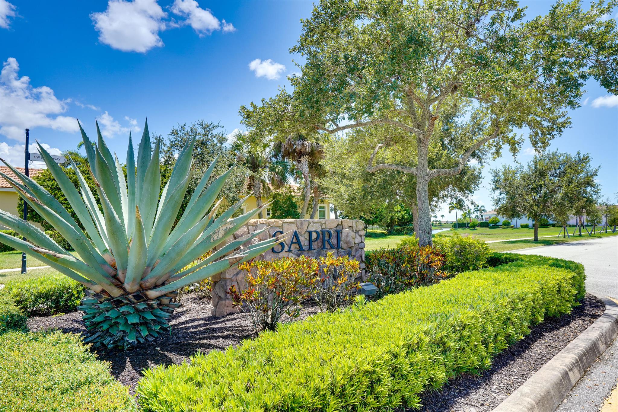 Exquisite home situated on a quiet dead end street, boasting double lake views in both the front and back. This spacious residence features two living areas, a den, and a formal dining room, perfect for entertaining.The den and living area showcase elegant moldings, adding a touch of sophistication. The kitchen is equipped with quartz countertops, pendant lighting, and a backsplash, complemented by a decorative finish on the island front. The Butler pantry create an ideal coffee spot.Outdoor enthusiasts will love the large patio overlooking the lake, where spectacular sunsets can be enjoyed every night. The covered patio features a retractable hurricane shade for added protection. The home also boasts tile flooring throughout and a home security camera system. Total features under doc