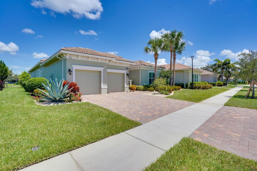 Photo of 17025 SW Sapri Way, Port Saint Lucie, FL 34986 (MLS # R11113472)