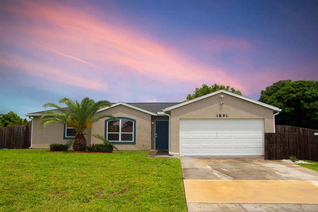 Photo of 1891 SW Cameo Boulevard, Port Saint Lucie, FL 34953 (MLS # R10742520)