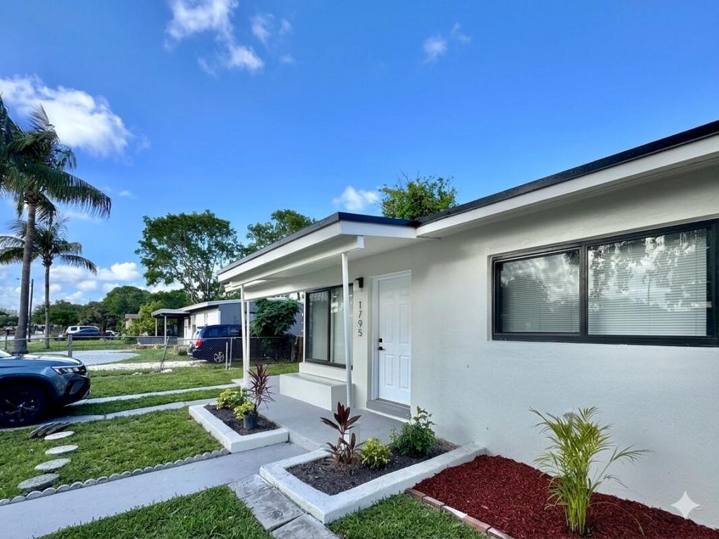 Photo of 1795 Lauderdale Manor Drive, Fort Lauderdale, FL 33311 (MLS # B26032743)