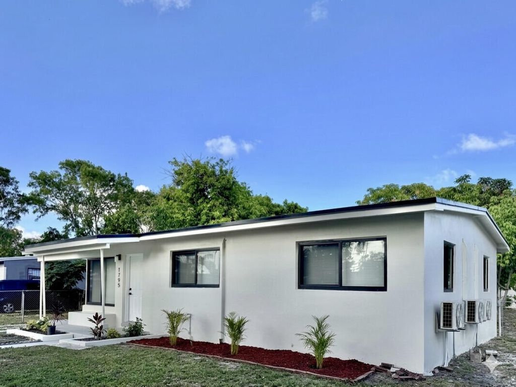Photo of 1795 Lauderdale Manor Drive, Fort Lauderdale, FL 33311 (MLS # B26032743)