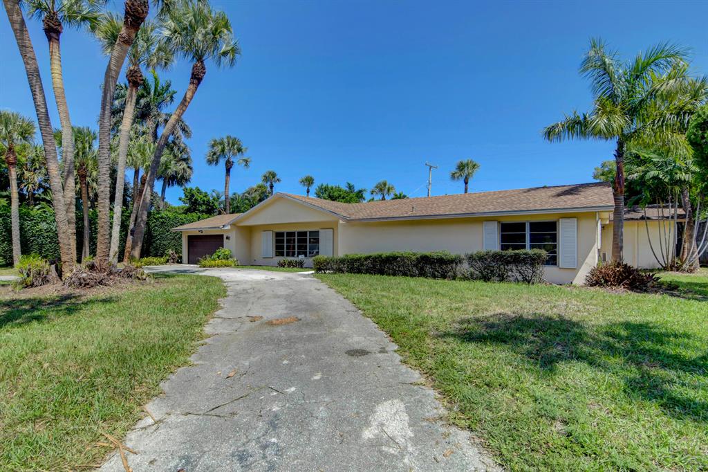 Photo of 3408 Washington Road, West Palm Beach, FL 33405 (MLS # R10746439)