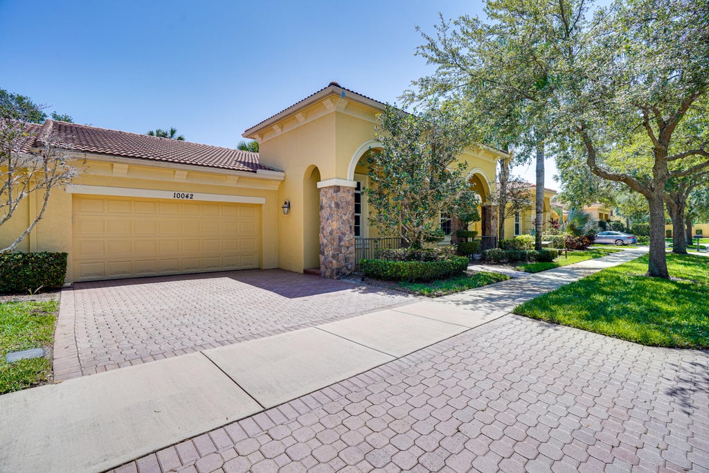 Photo of 10042 SW Canossa Way, Port Saint Lucie, FL 34986 (MLS # R10987445)