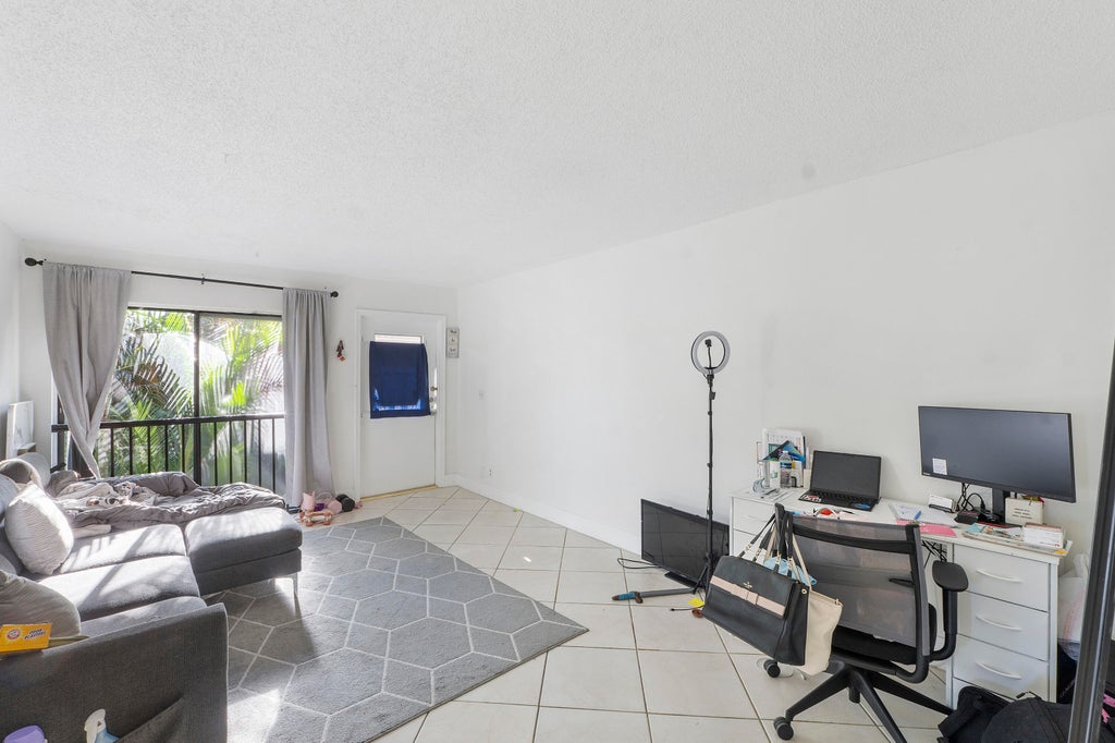 Photo of 11392 Royal Palm Boulevard #11392, Coral Springs, FL 33065 (MLS # B26077935)