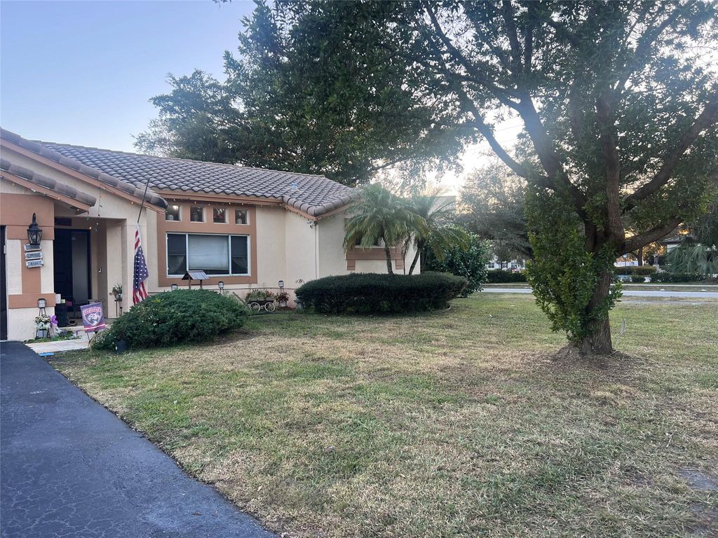 Photo of 9876 NW 28th Court, Coral Springs, FL 33065 (MLS # F10551067)