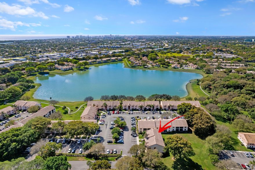 GORGEOUS WATER'S EDGE CONDO | SPECTACULAR LAKE WINDWOOD | BIKE/JOG TO BEACH | BREATHTAKING WATER VIEWS | WILDLIFE PRESERVE | OPEN GREEN SPACE | Bright Open Floor Plan | Volume Ceilings | Wood Floors | LED Custom Lighting | Beautiful Eat-in Kitchen | Wood Cabinets | Granite Counters | Pantry | Large Primary Bedroom with Walk-In Closet & Oversized Ensuite | Private Screened Balcony | Tropical Lush Manicured Landscaping | Front Loader Washer/Dryer | Assigned & Guest Parking | Resort-Style Amenities | 24-Hour Manned Gate | 2 Clubhouse Pools | Dog Park | BBQ Picnic Area | Jog/Bike Trail | Tennis/Basketball/Racquetball | 1.5 Miles to Beach | Minutes to FAU, Mizner Park, Atlantic Ave,1-95 | A+ Rated Schools | Rent Immediately | Pet Friendly | AC 2005 | WH 2014 | Present All Offers!