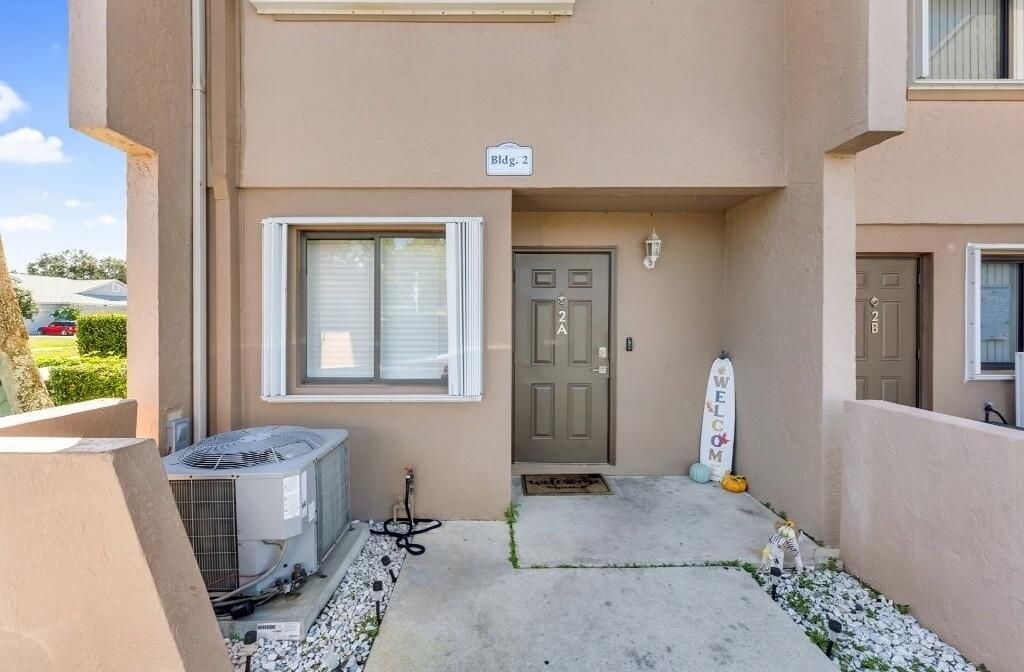 Photo of 139 Sparrow Drive #2a, Royal Palm Beach, FL 33411 (MLS # R11137380)