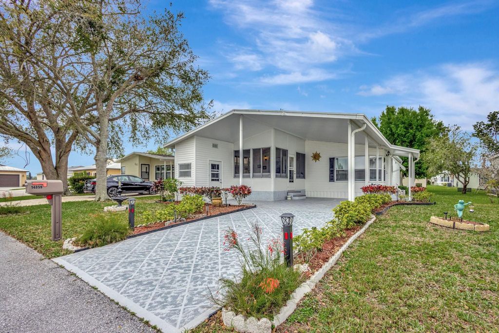 Photo of 14359 Cancun Avenue, Fort Pierce, FL 34951 (MLS # F10493937)