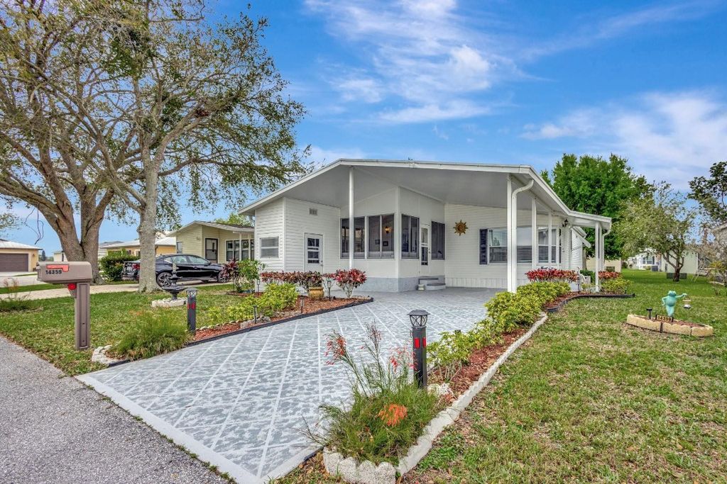 Photo of 14359 Cancun Avenue, Fort Pierce, FL 34951 (MLS # F10493937)