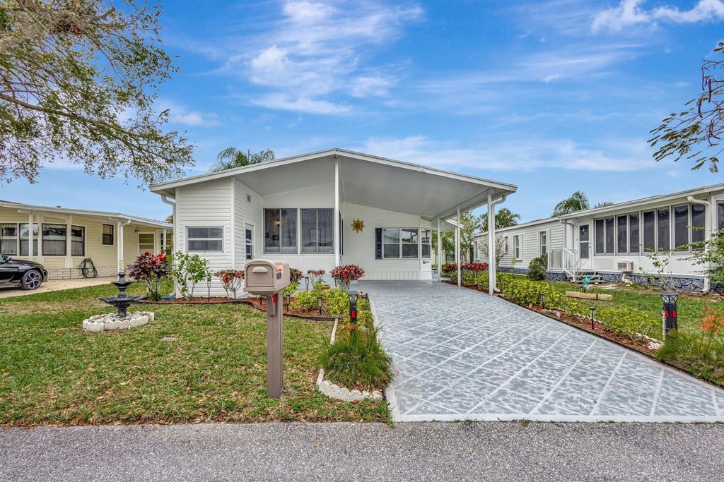 Photo of 14359 Cancun Avenue, Fort Pierce, FL 34951 (MLS # F10493937)