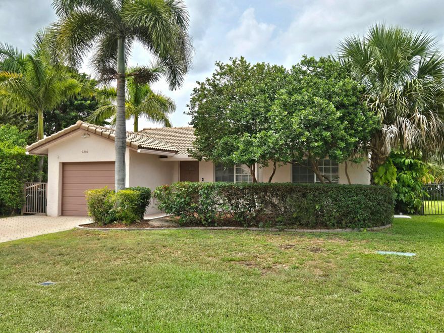Beautifully updated 3-bedroom, 2-bath home with a 1-car garage in a peaceful West Tamarac neighborhood. Features tile flooring throughout the living areas, a large driveway with plenty of parking, and French doors leading to an extended covered and screened patio perfect for entertaining.  Walking distance to several parks and close to great schools, restaurants, shopping, and everyday conveniences. Enjoy direct views of the annual 4th of July fireworks show, plus access to a beautiful community pool and clubhouse.