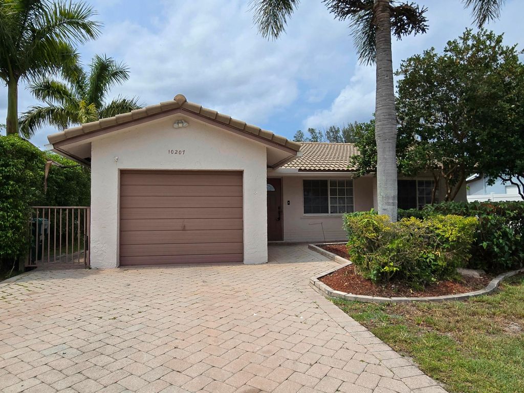 Photo of 10207 NW 82nd Street, Tamarac, FL 33321 (MLS # B26027495)