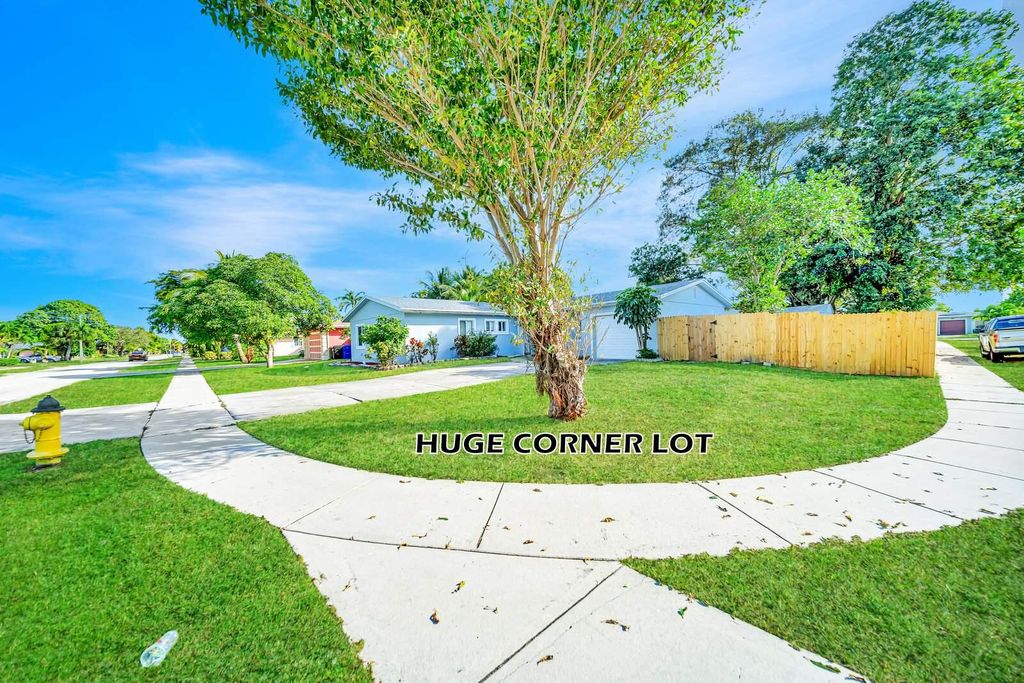 Photo of 6812 Rio Pinar, North Lauderdale, FL 33068 (MLS # R11143866)