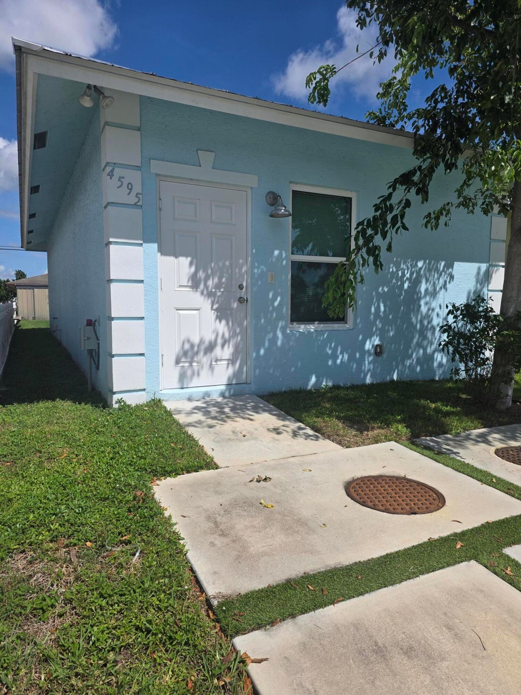 Photo of 4595 Cambridge Street, Lake Worth Beach, FL 33463 (MLS # B26085049)