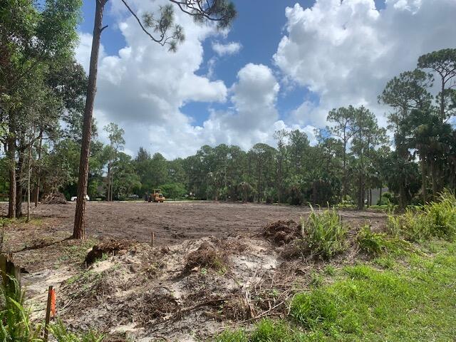 Here's the perfect opportunity to build your dream home in the highly desired community of Jupiter Farms! This cleared 1.5 acre lot is south facing and HIGH AND DRY!  The property is surrounded by dirt and paved roads with tons of natural vegetation including  palm, oak and pine trees.Don't miss this opportunity to be a part of a spacious, peaceful Jupiter community with NO HOA FEES OR RESTRICTIONS!Located south of Indiantown Road, but stillclose to the Publix plaza, restaurants and beaches.Note - The seller has custom home plans  designed specifically for this lot. Available upon request.