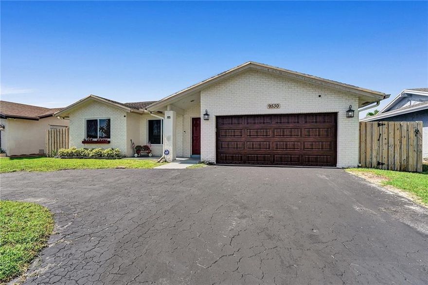 PARADISE AWAITS YOU! Incredible home located in the heart of Tamarac central location close to the Sawgrass! 3 bedroom 2 bath  2 car garage features all impact windows, doors & garage door. Solid wood kitchen with quartz countertops and Stainless steel appliances. Luxury vinyl flooring throughout the entire home. completely fenced in backyard is complete privacy. complete ADT system hardwired installed. A/C replaced in 2017. Entire home covered with Termite Protection through Terminix expires October 2022 also Home Warranty Service transfers to new owner. Come make this your next home!