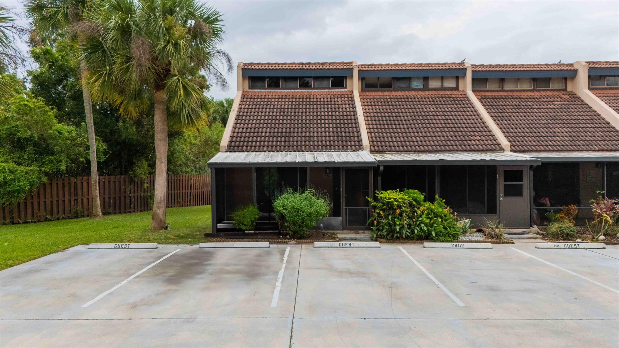 Welcome home to this delightful and cozy 1-bedroom, 1-bathroom townhome with a loft that could easily serve as a second bedroom. Located just east of US1, you're moments away from beaches, shopping, restaurants, and hospitals while being in the peaceful & private Seagrass community, this corner unit offers the perfect balance of seclusion & convenience. An oversized porch allows you to enjoy the sounds of nature outside.In this unit is a spacious kitchen with granite countertops and a breakfast bar, along with tile flooring throughout the first floor and laminate flooring on the second level and stairs. The bathroom includes a tiled shower with a frameless glass door. Washer and dryer included. Impact Glass Windows and a new water heater recently installed. Tenant Occupied