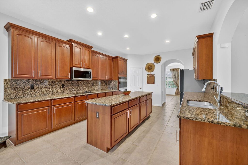 Photo of 546 SE Nome Drive, Port Saint Lucie, FL 34984 (MLS # R11114452)