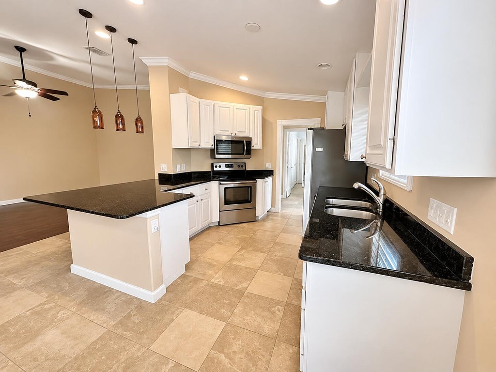 Photo of 11215 SW Pembroke Drive, Port Saint Lucie, FL 34987 (MLS # B26092122)