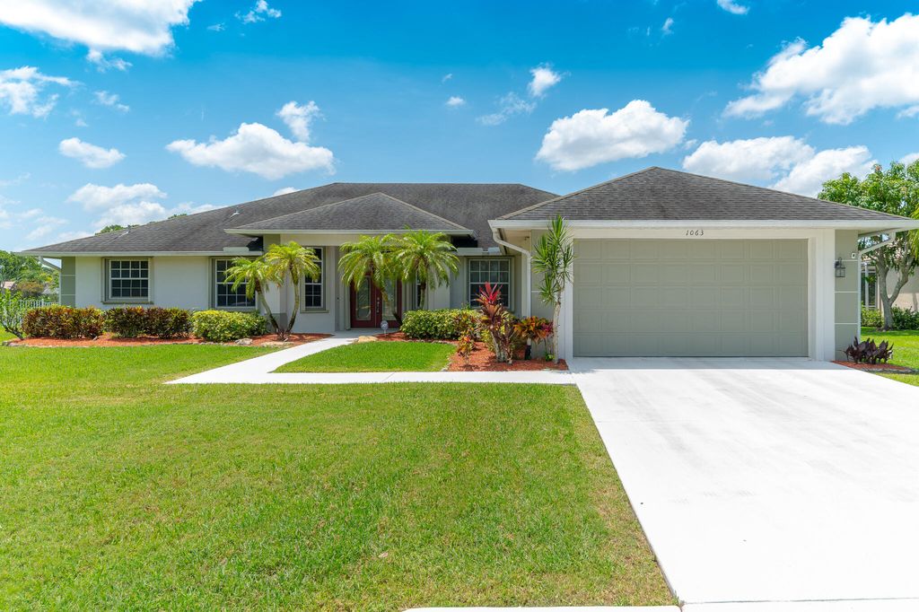 Photo of 1063 SW Sand Oak Drive, Palm City, FL 34990 (MLS # R11104677)