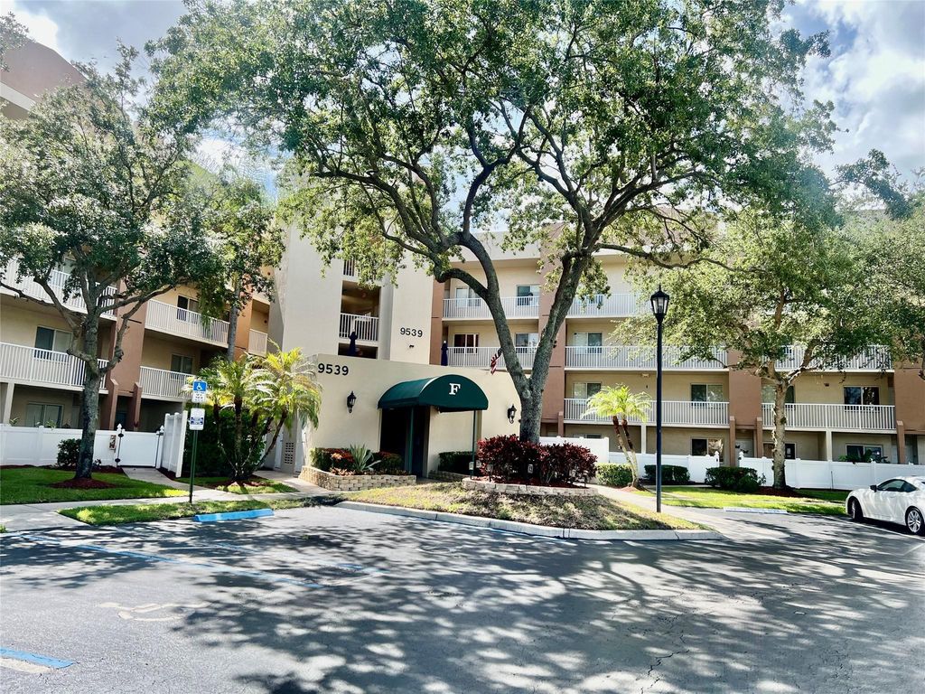 Photo of 9539 Weldon Cir #F406, Tamarac, FL 33321 (MLS # F10512913)