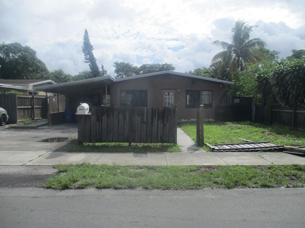 Photo of 1220 NW 7th Ter, Fort Lauderdale, FL 33311 (MLS # F10526312)