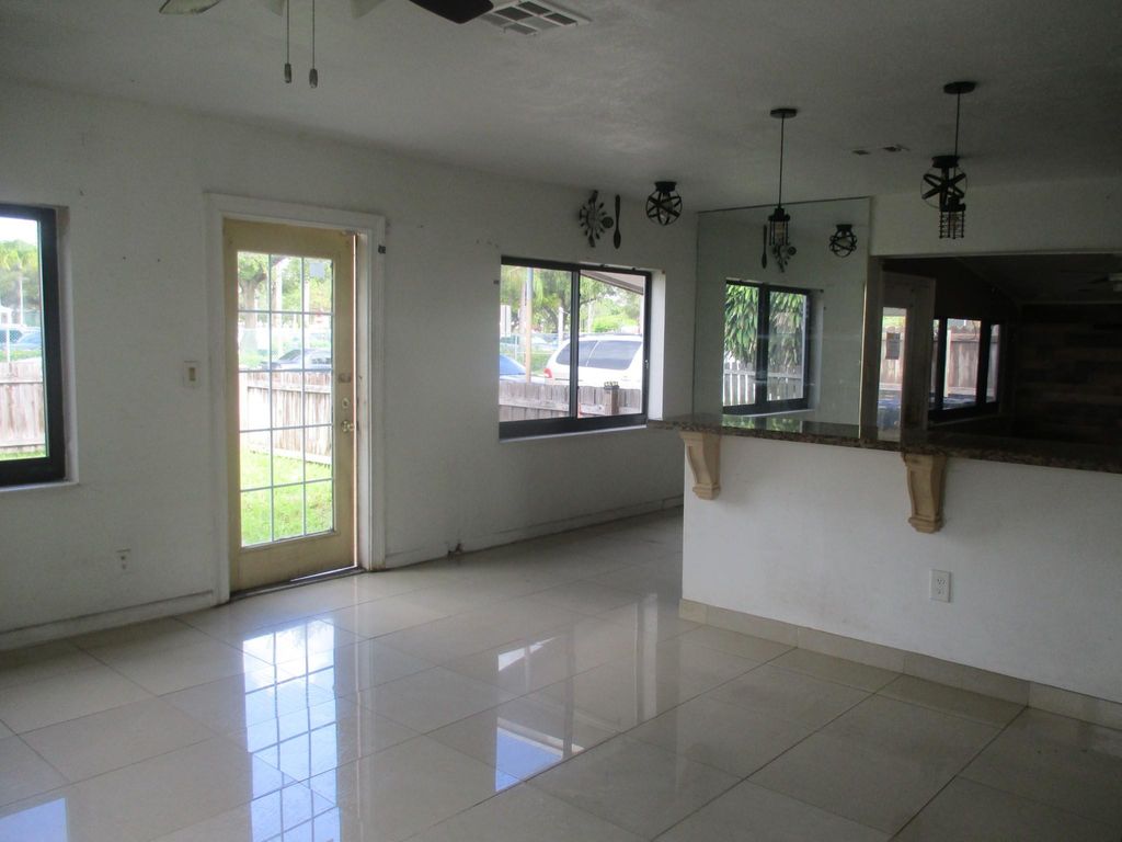 Photo of 1220 NW 7th Ter, Fort Lauderdale, FL 33311 (MLS # F10526312)