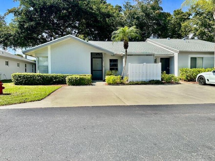 Welcome home to this well maintained 2/2 corner villa, offering the perfect blend of comfort and style. This  light and bright residence boasts a seamless, open feel. Enjoy the durability of sleek tile in the kitchen and entry, flowing into cozy, wood-look flooring throughout the rest of the home. With two parking spots immediately in front, this property offers ultimate convenience in a peaceful setting.
Whisper Walk is an  active, 55+ gated community, offering a fabulous range of amenities, including a clubhouse with large resort-style pool, tennis & pickleball courts, fitness center, Billiards, Bocce Ball, community room, game room and library! No leasing first 2 years.