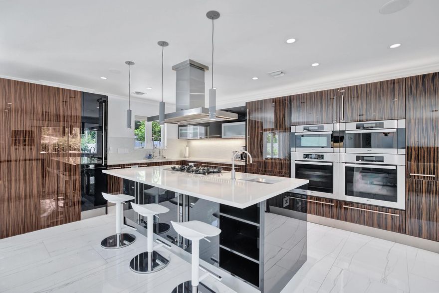 Prepared to be impressed when you step into this completely remodeled home. This residence includes a chefs kitchen with S/S Miele appliances + wine fridge, huge island, slick finishes and upgrades, impact windows and doors with electric roller shades, washer/dryer, heated pool, & covered patio. Exterior has been freshly painted a crisp white to compliment the modern design inside. The conveniences of this home makes it perfect for your primary residence or investment (available furnished so you can rent right away). Located on a quiet street with friendly neighbors and a great family-friendly feel. A quick 8 minute drive or 14 min bike ride to beach; great access to downtown Ft Lauderdale; restaurants, coffee shops, brewery (Funky Buddha), Publix & Target within walking distance.