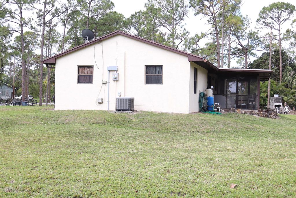 Photo of 13573 41st Lane N, The Acreage, FL 33411 (MLS # R11079192)