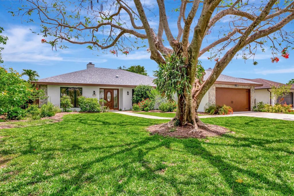 Photo of 7415 Woodland Creek Lane, Lake Worth, FL 33467 (MLS # F10503754)