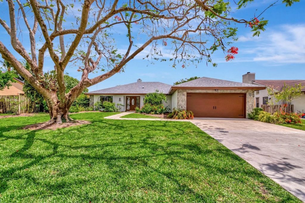 Photo of 7415 Woodland Creek Lane, Lake Worth, FL 33467 (MLS # F10503754)