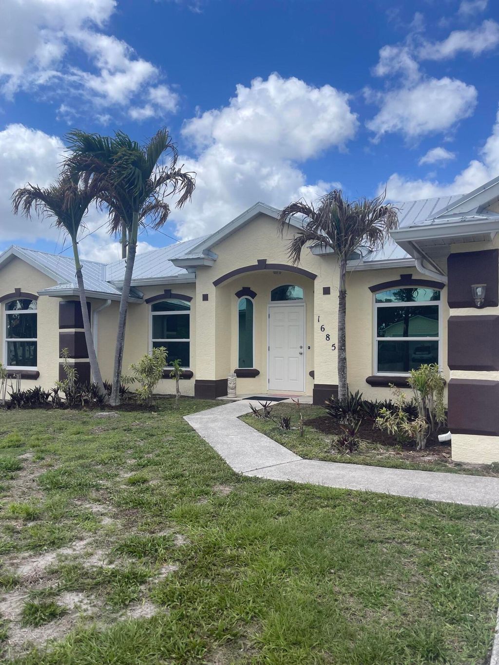 Photo of 1685 SW Starman Avenue, Port Saint Lucie, FL 34953 (MLS # B26015018)