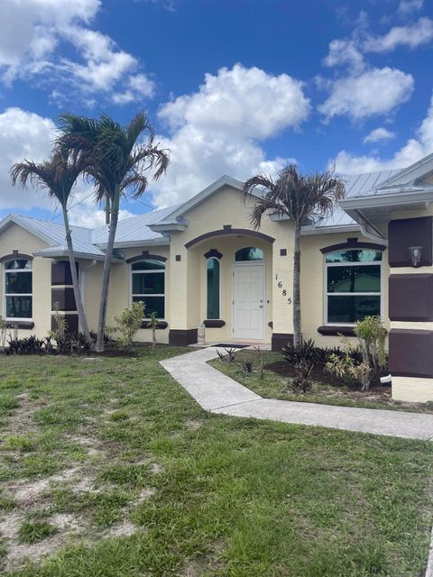 Photo of 1685 SW Starman Avenue, Port Saint Lucie, FL 34953 (MLS # B26015018)