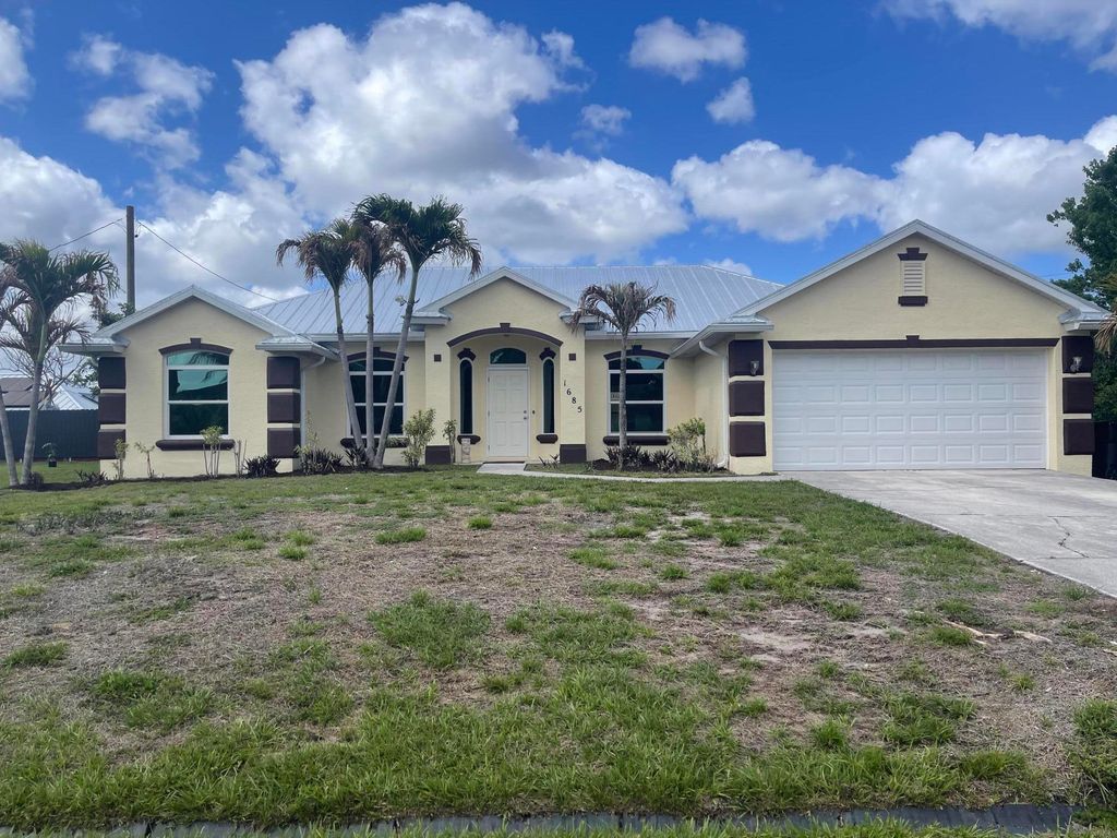 Photo of 1685 SW Starman Avenue, Port Saint Lucie, FL 34953 (MLS # B26015018)