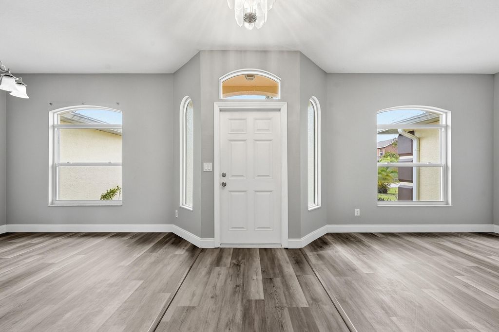 Photo of 1685 SW Starman Avenue, Port Saint Lucie, FL 34953 (MLS # B26015018)