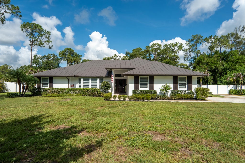 Photo of 17767 Mellen Lane, Jupiter, FL 33478 (MLS # B26042258)