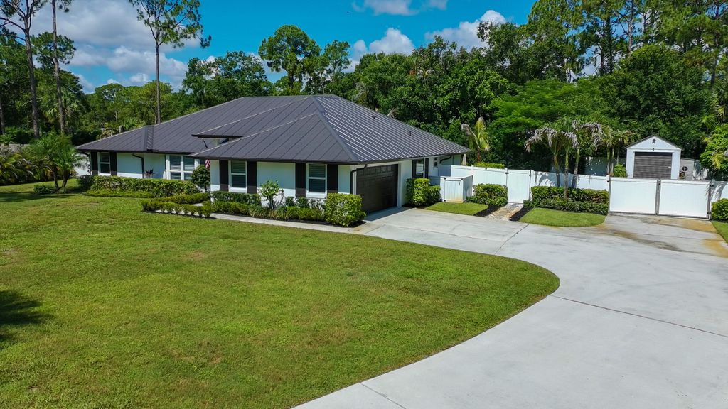 Photo of 17767 Mellen Lane, Jupiter, FL 33478 (MLS # B26042258)