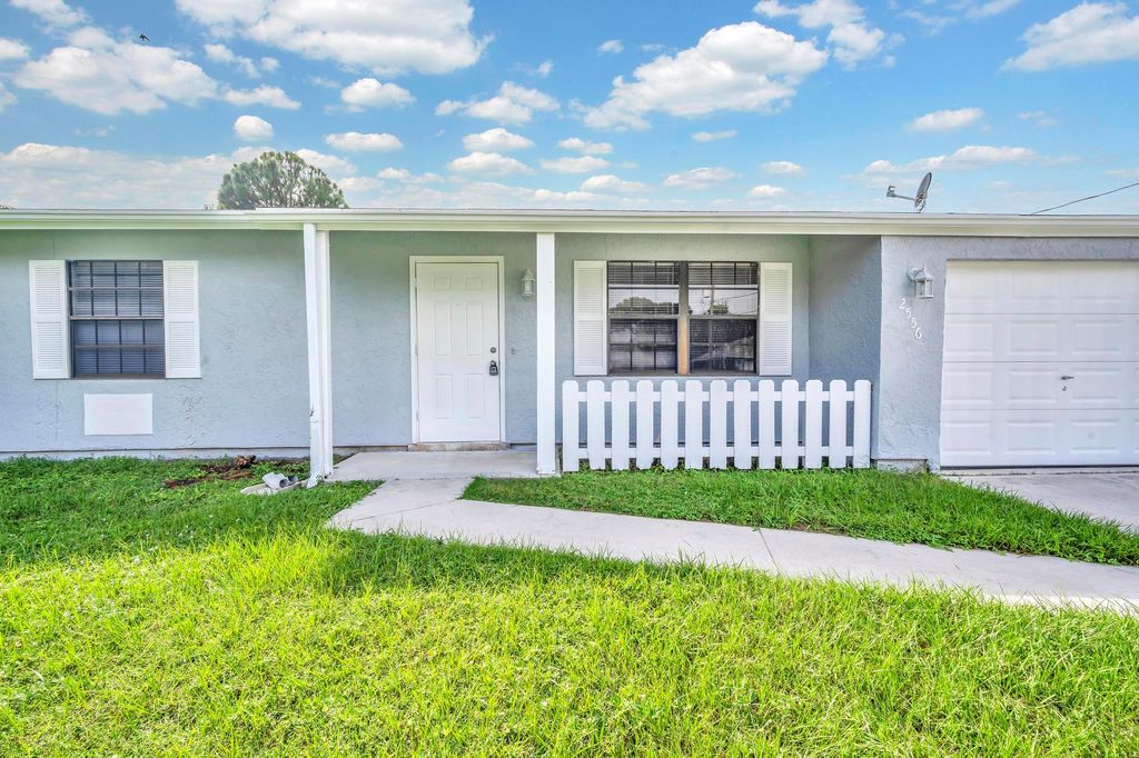 Photo of 2556 SE Hallahan Street, Port St Lucie, FL 34952 (MLS # R10923651)