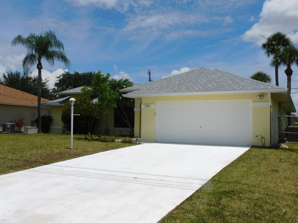 Photo of 1101 SW Alcantarra Boulevard, Port Saint Lucie, FL 34953 (MLS # R10995043)