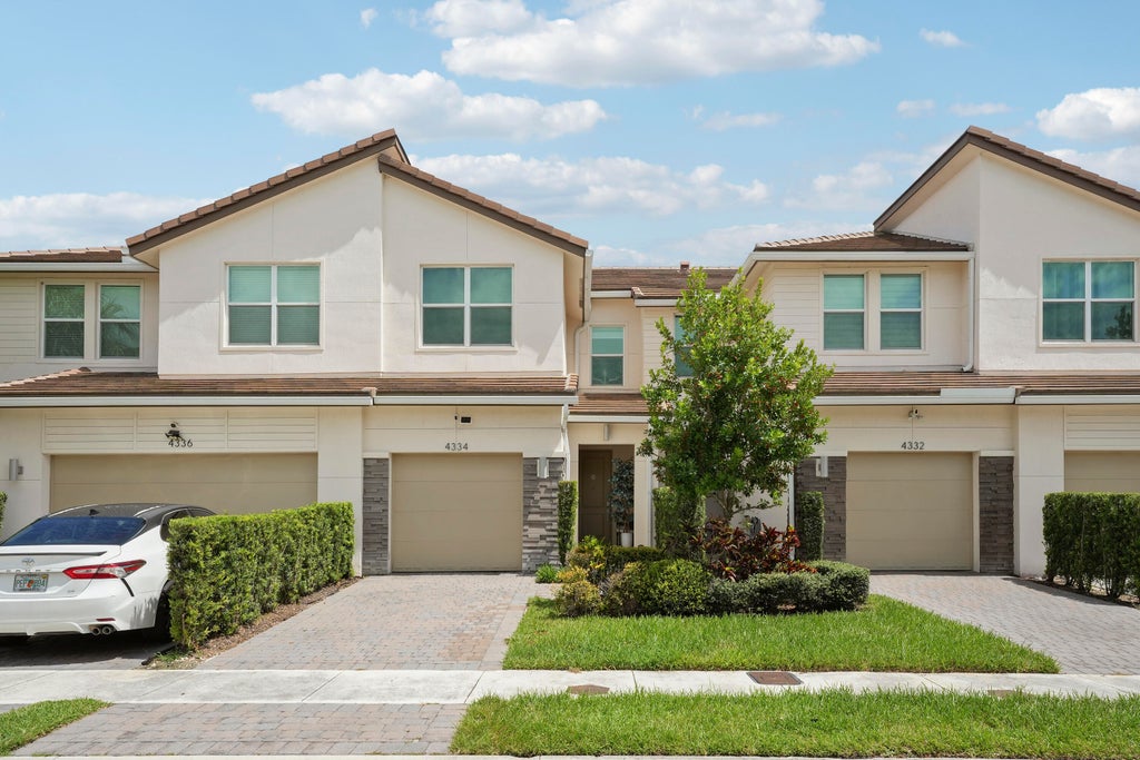 Photo of 4334 Veleiros Avenue, Deerfield Beach, FL 33064 (MLS # B26080388)