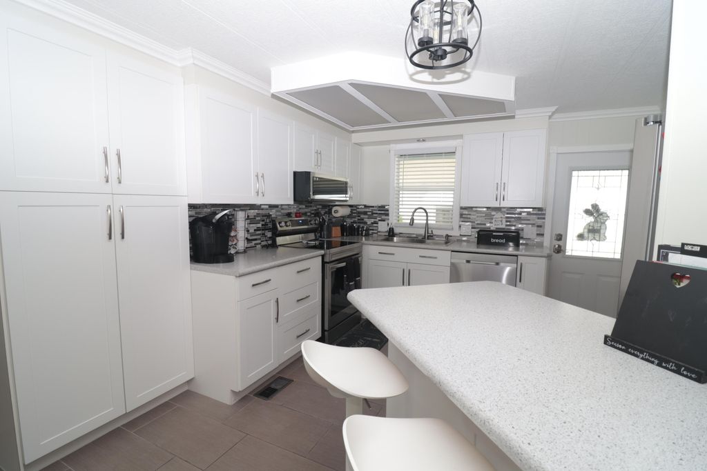 Photo of 41014 Isabel Bay, Boynton Beach, FL 33436 (MLS # B26003801)