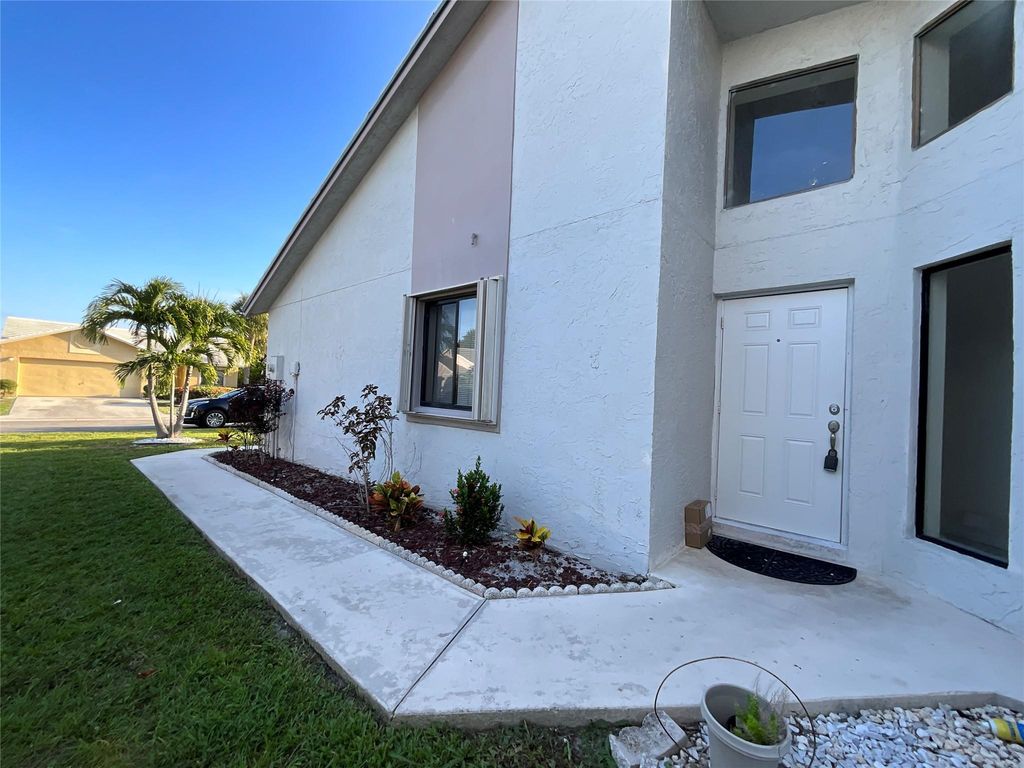 Photo of 5700 Strawberry Lakes Circle, Lake Worth, FL 33463 (MLS # F10450903)